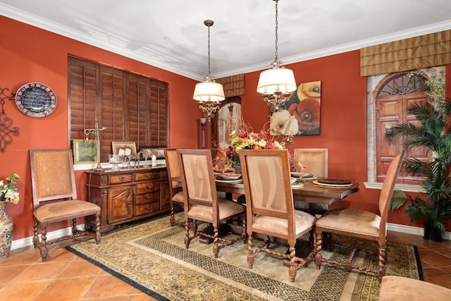 dining area featuring tile patterned flooring and ornamental molding