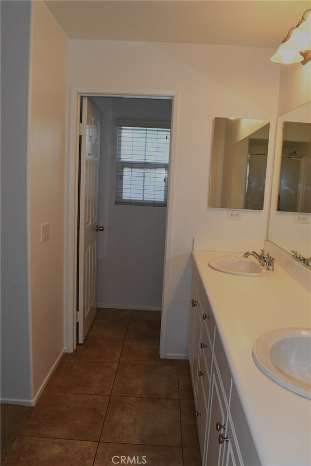 bathroom with vanity and tile patterned floors