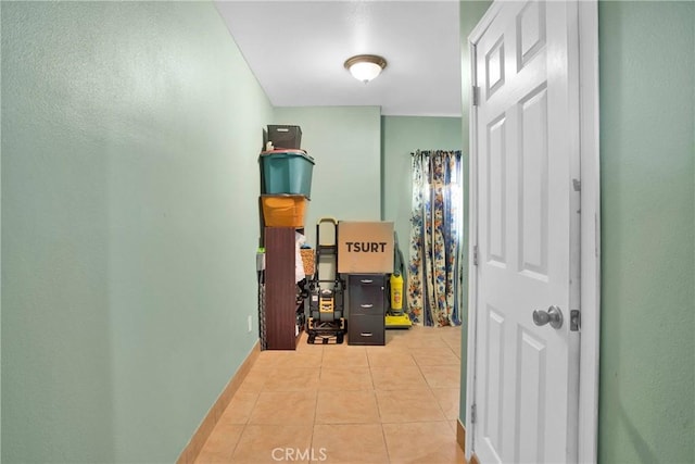 hallway with light tile patterned flooring