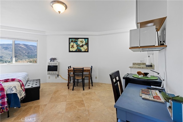 dining room with heating unit