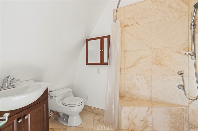 bathroom with walk in shower, vanity, tile patterned flooring, and toilet