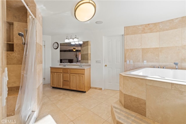 bathroom featuring tile patterned floors, separate shower and tub, and vanity