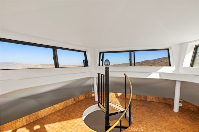 interior space featuring a mountain view and parquet floors