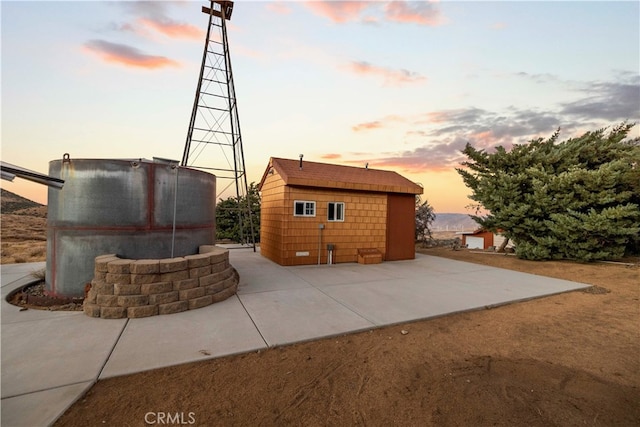 view of property exterior at dusk