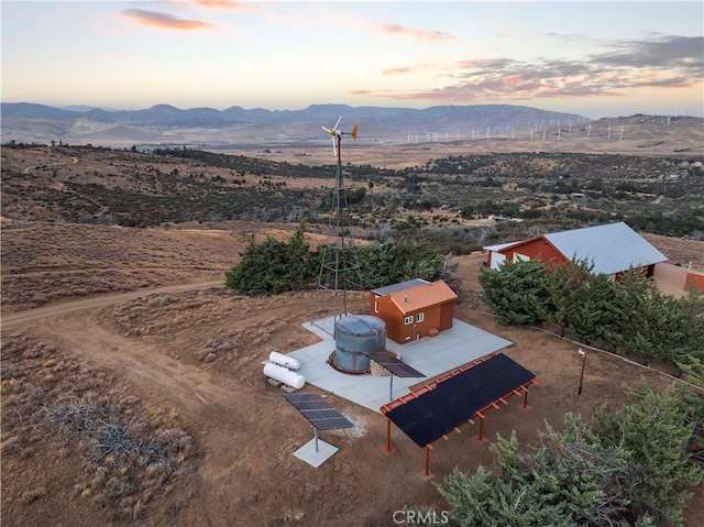 aerial view at dusk with a mountain view