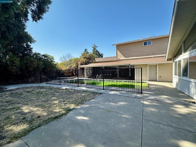 exterior space featuring a lawn and a patio