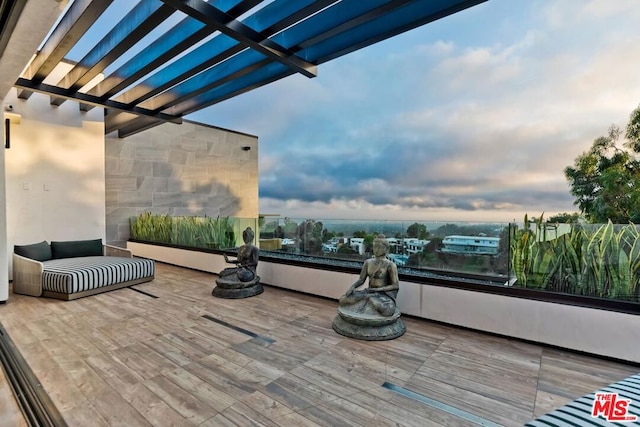 view of patio featuring a pergola