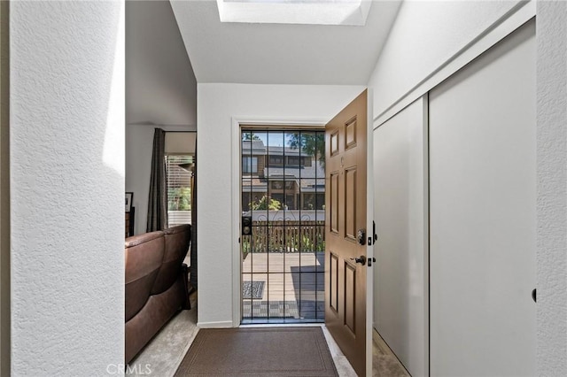 entryway with a skylight