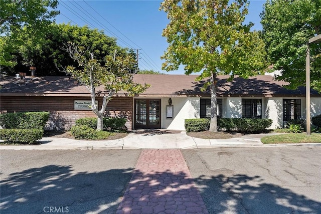 single story home with french doors