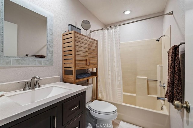 full bathroom featuring shower / bath combination with curtain, vanity, and toilet