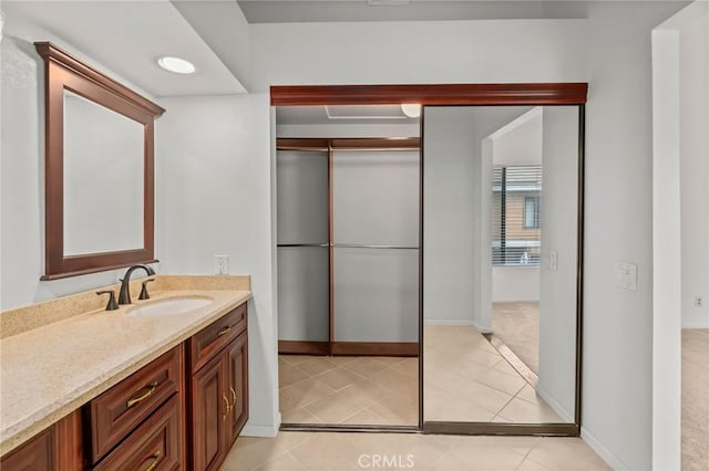 bathroom with vanity and tile patterned floors