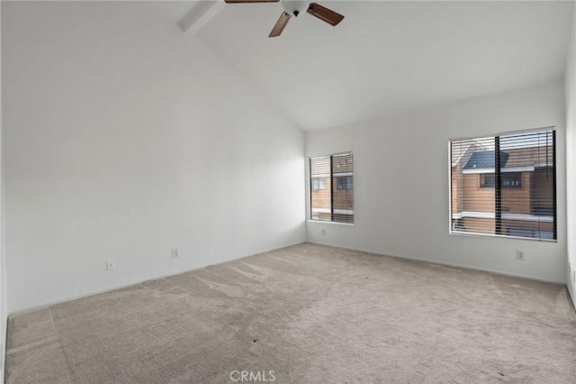 spare room with high vaulted ceiling, light colored carpet, beamed ceiling, and ceiling fan