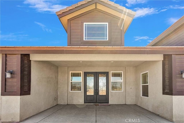 property entrance with french doors