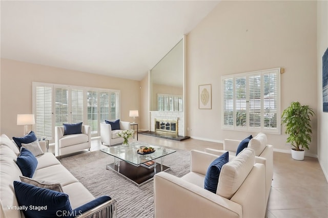 living room featuring high vaulted ceiling