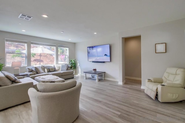 living room featuring light wood-type flooring