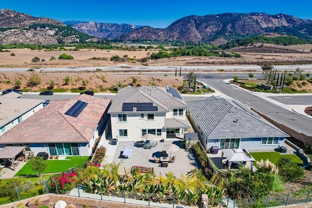 drone / aerial view featuring a mountain view