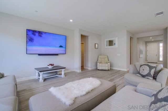 living room featuring light wood-type flooring