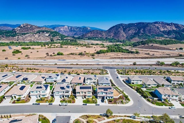 drone / aerial view featuring a mountain view