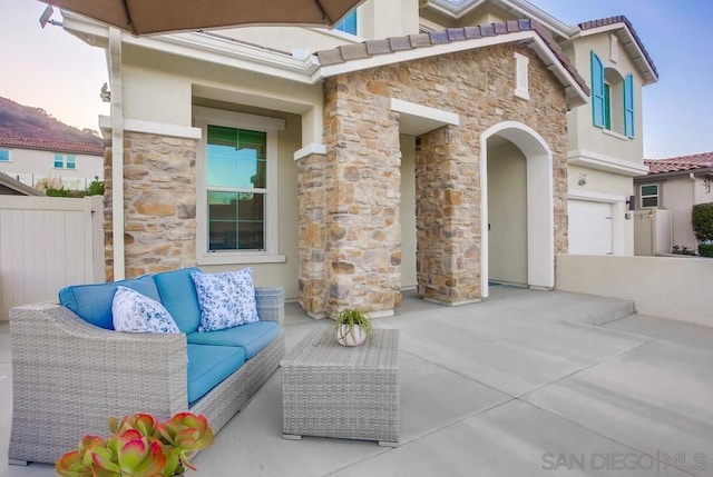 view of patio / terrace with a garage