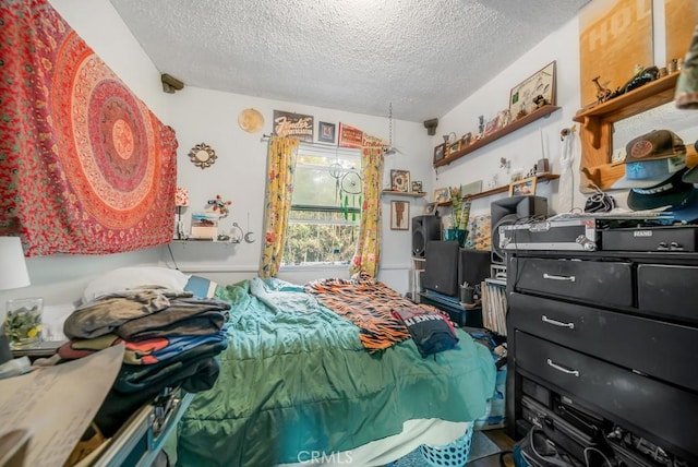 bedroom featuring a textured ceiling