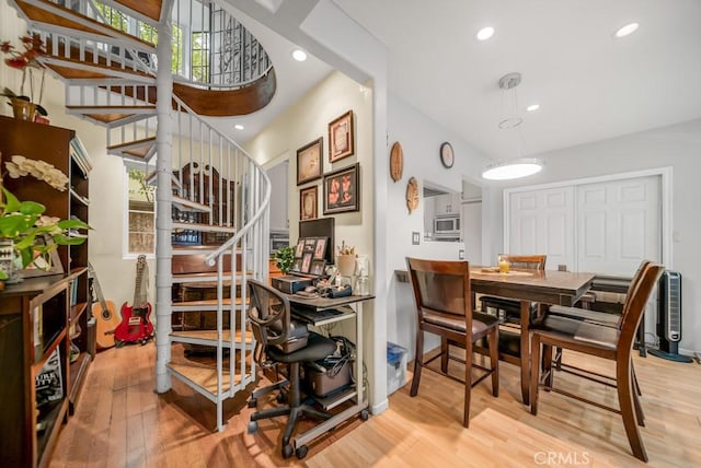 dining area with hardwood / wood-style flooring