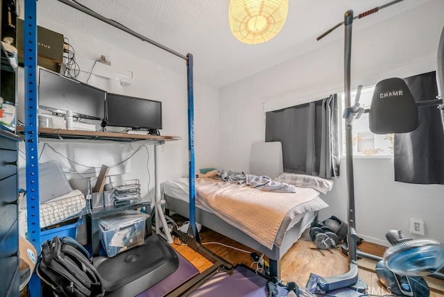 bedroom featuring wood-type flooring