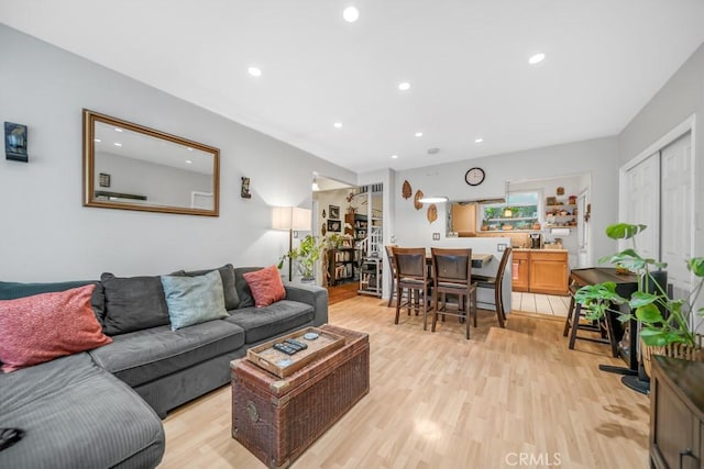 living room with light hardwood / wood-style floors