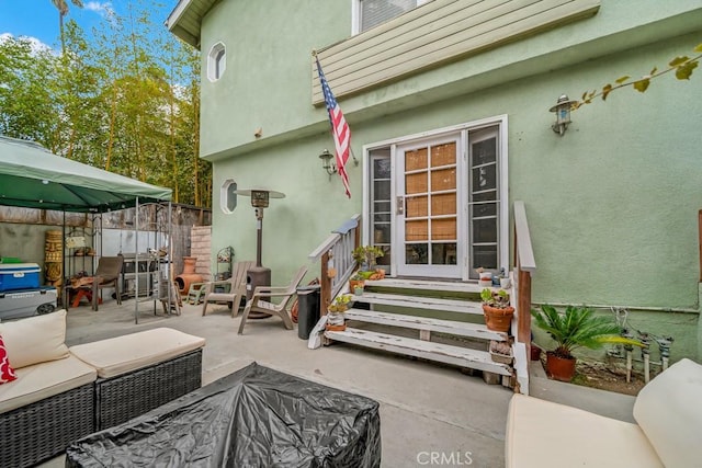 exterior space with an outdoor living space and a patio