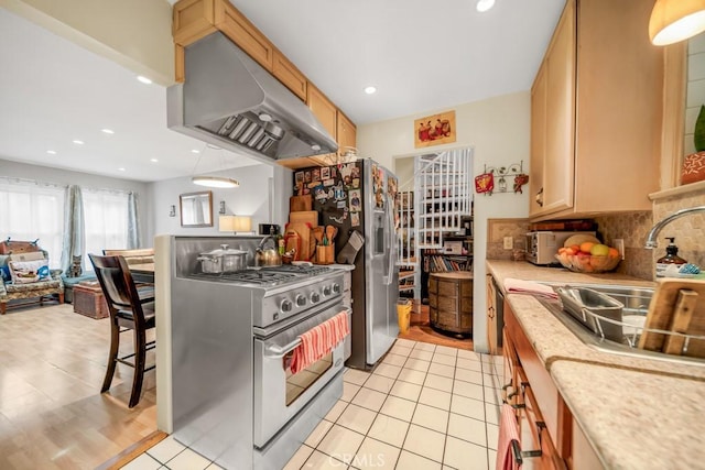 kitchen featuring light tile patterned floors, sink, range hood, stainless steel appliances, and tasteful backsplash