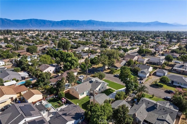 birds eye view of property with a residential view and a mountain view