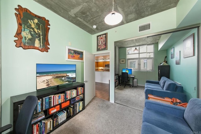 living room featuring carpet and visible vents