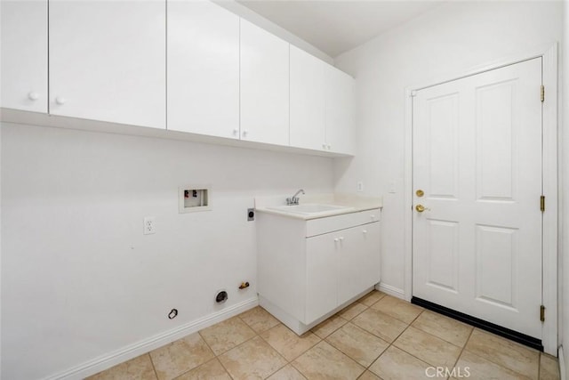 laundry area featuring cabinets, washer hookup, sink, light tile patterned floors, and hookup for a gas dryer