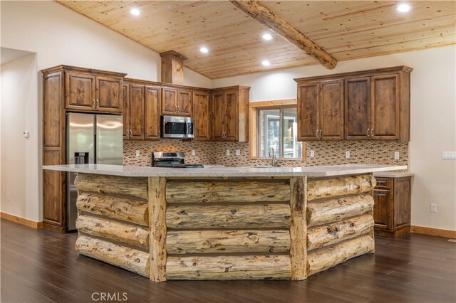 kitchen with vaulted ceiling with beams, appliances with stainless steel finishes, dark wood-type flooring, and wooden ceiling