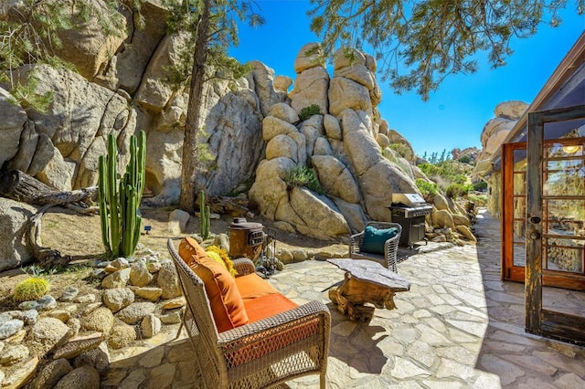 view of patio / terrace with a sunroom