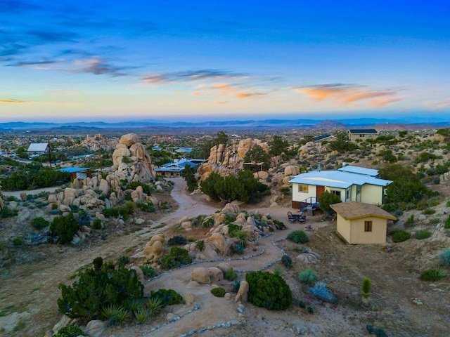 view of aerial view at dusk