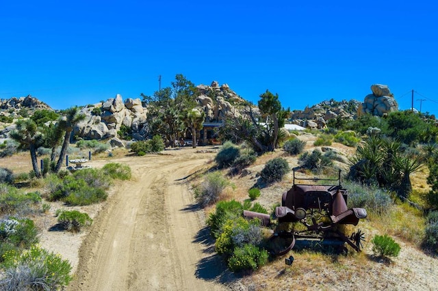 birds eye view of property featuring a rural view