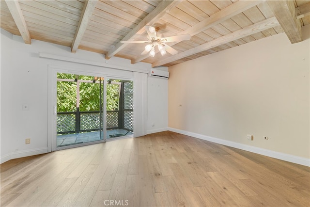 empty room featuring beamed ceiling, a wall mounted air conditioner, light wood-type flooring, and ceiling fan