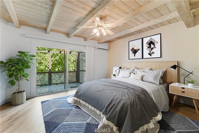 bedroom featuring access to outside, a wall mounted AC, beamed ceiling, and light wood-type flooring