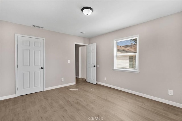 unfurnished bedroom featuring light hardwood / wood-style flooring