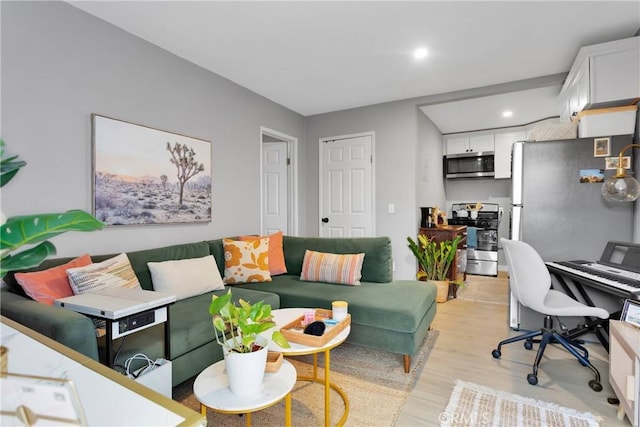 living room with light hardwood / wood-style floors