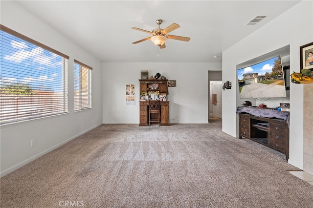 living room featuring light carpet and ceiling fan