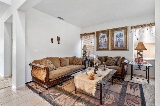 living room with light tile patterned floors