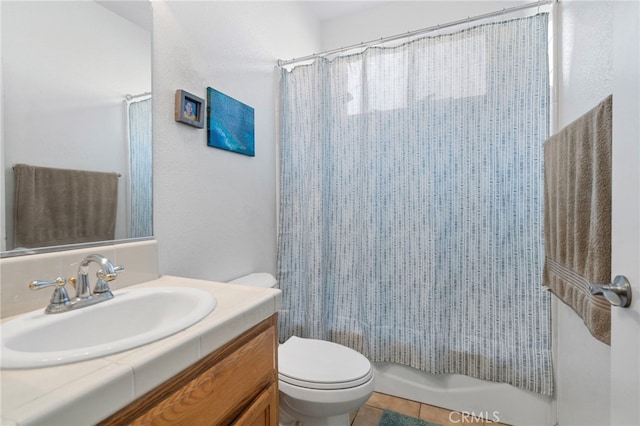 full bathroom with tile patterned flooring, vanity, toilet, and shower / tub combo