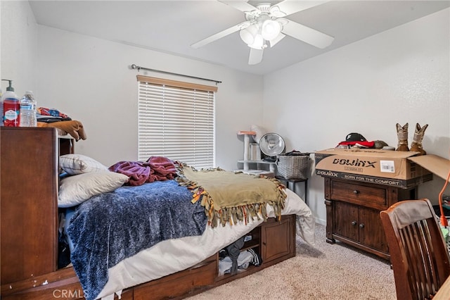 bedroom with light colored carpet and ceiling fan