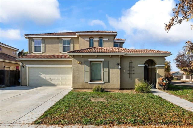 mediterranean / spanish-style house featuring a garage