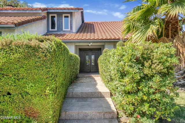 property entrance with french doors