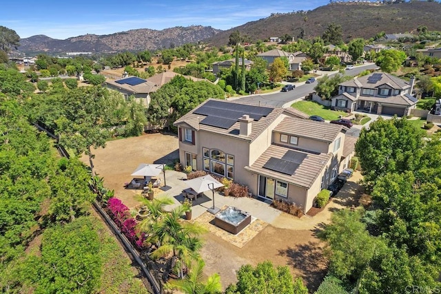 birds eye view of property featuring a residential view and a mountain view