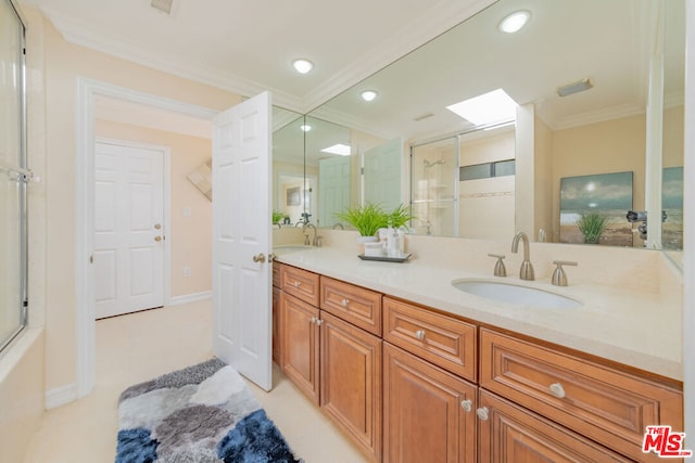 bathroom featuring crown molding, vanity, and shower / bath combination with glass door