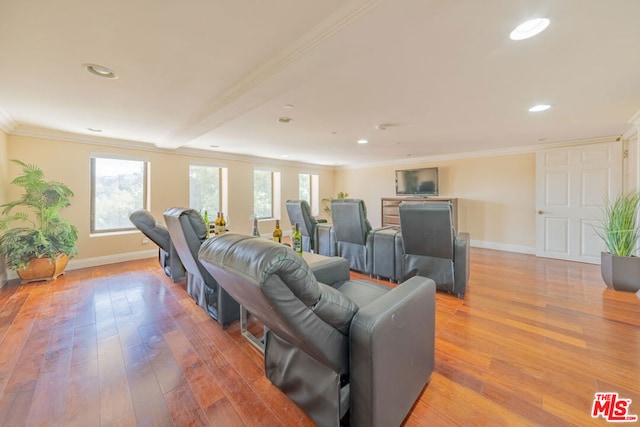 interior space featuring ornamental molding, wood-type flooring, and beamed ceiling