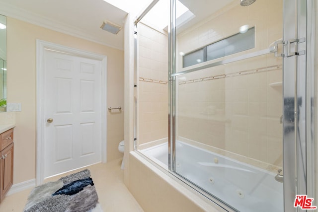 full bathroom featuring shower / bath combination with glass door, vanity, crown molding, and toilet